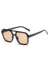 Sunglasses with black frame and gold-tinted lenses